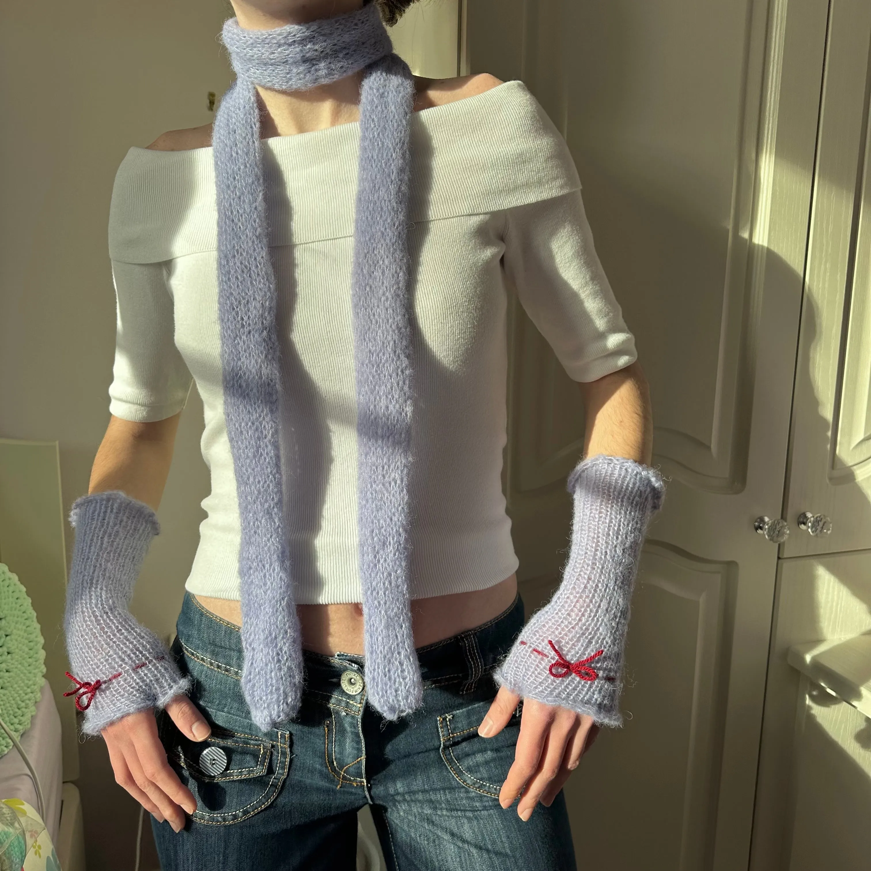 Handmade knitted mohair skinny scarf in baby blue